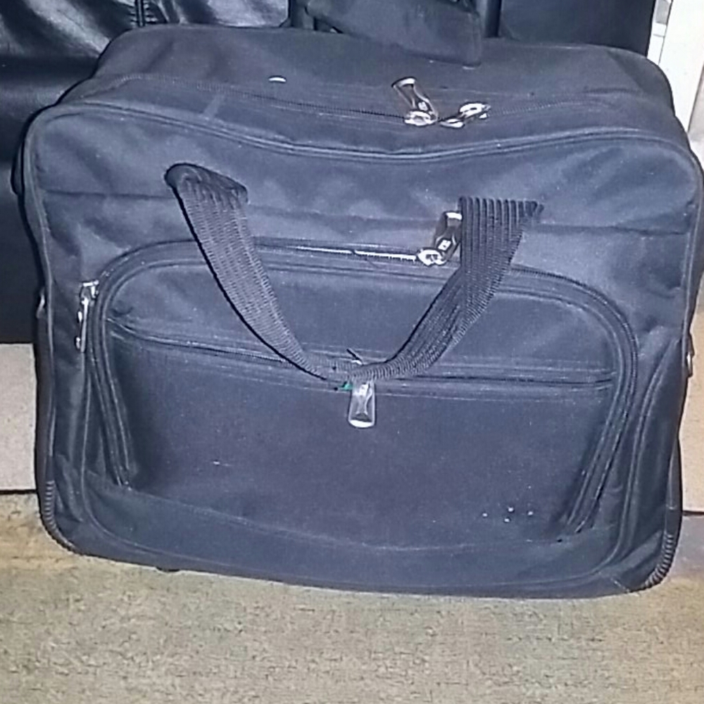 Olympia travel bag/brief case roll on